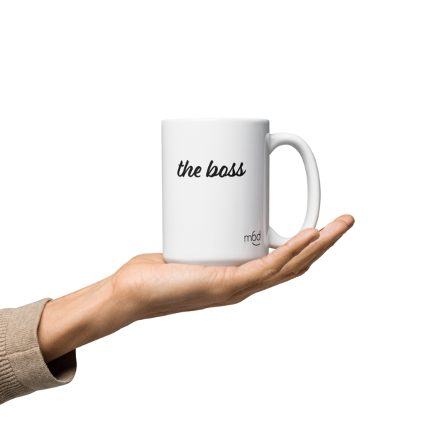 White ceramic The Boss Mug with bold, commanding inscription on a clean background